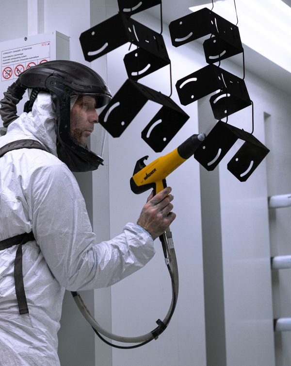 Manual powder coating in personal safety gear